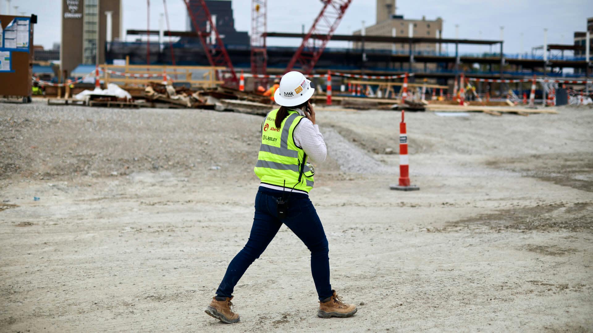 Sarah Narjes walking on the construction site