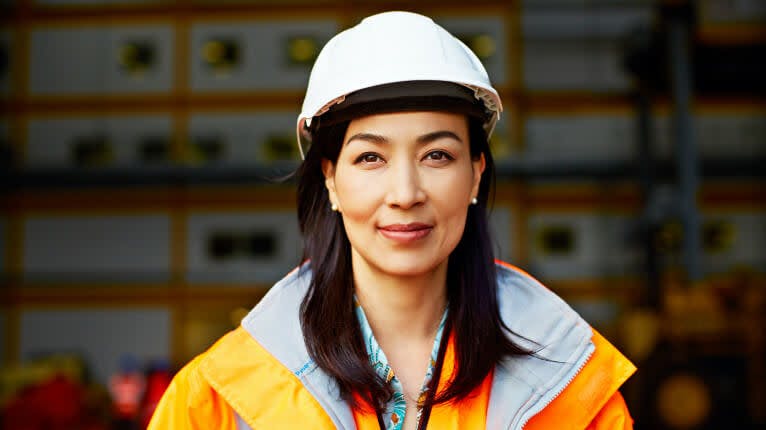 Female construction worker wearing PPE