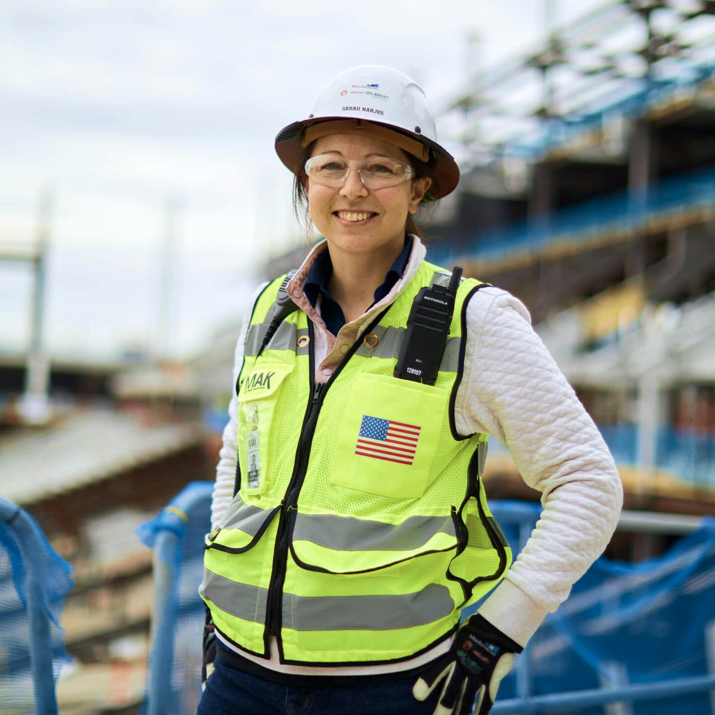 Sarah Narjes standing on the construction of the stadium