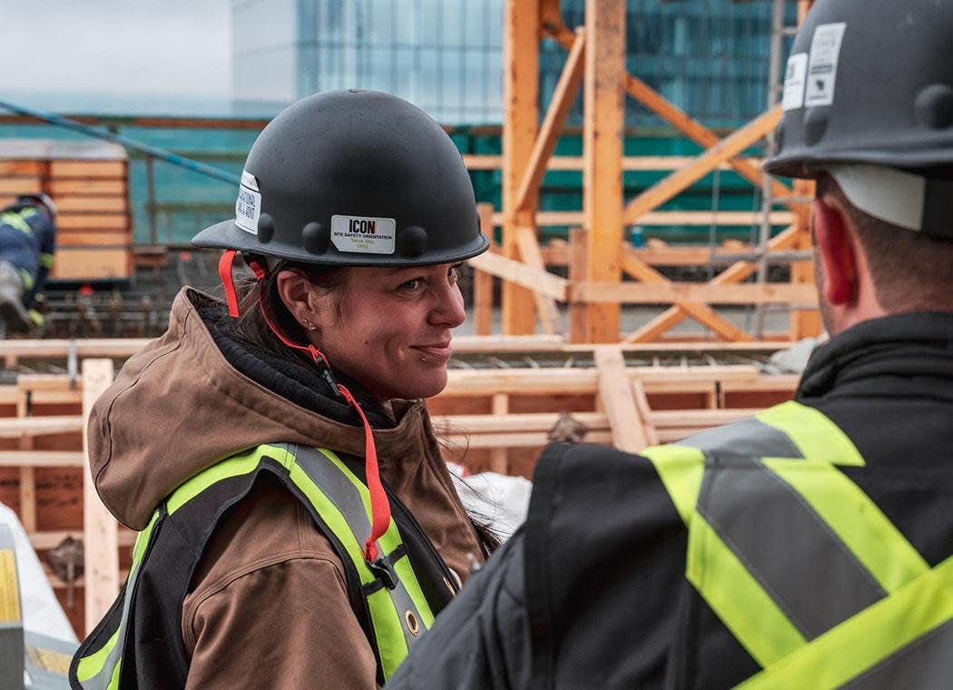 Contractors smiling at each other