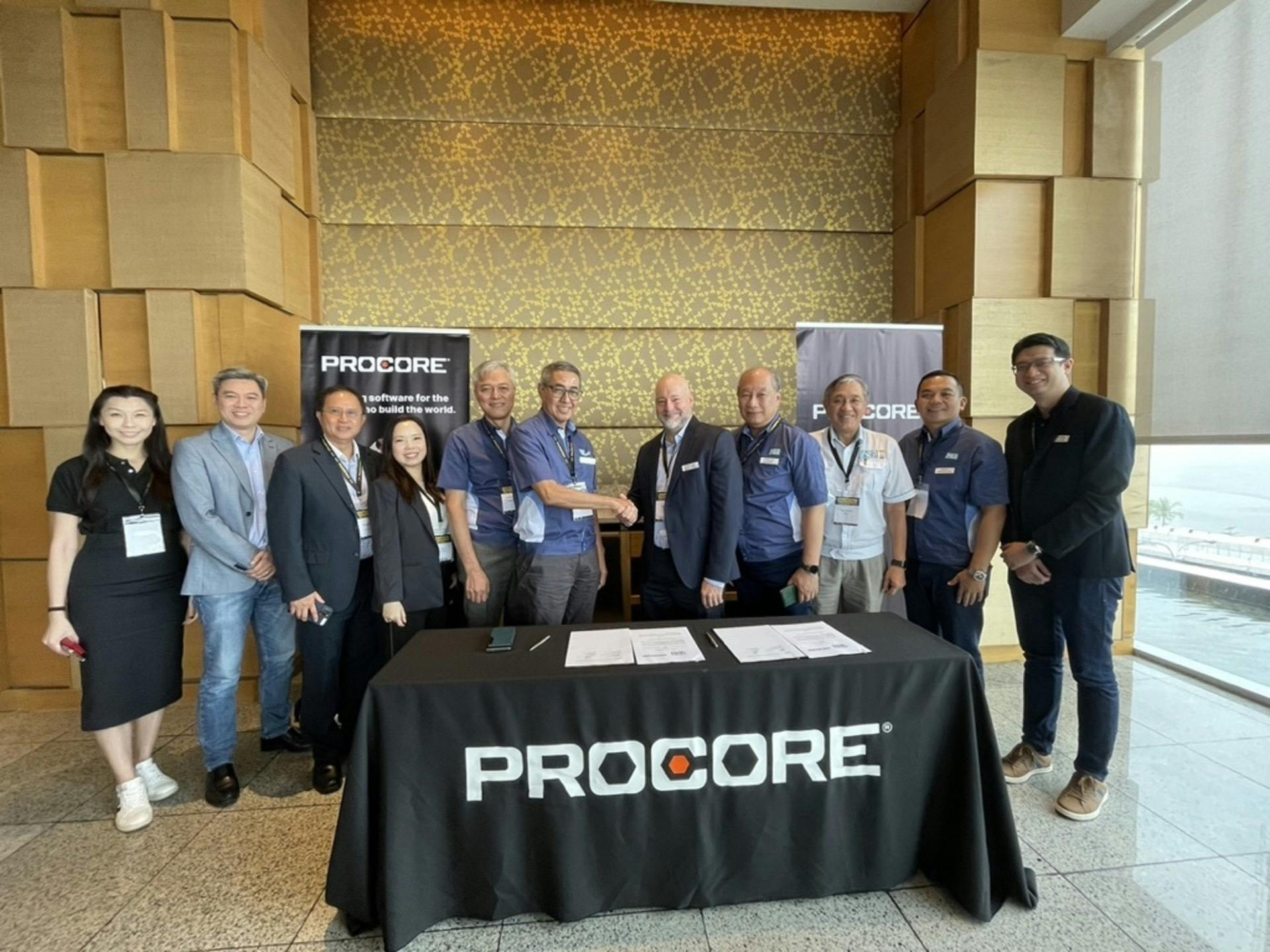 Philippine Constructors Association shaking hands with Procore's team