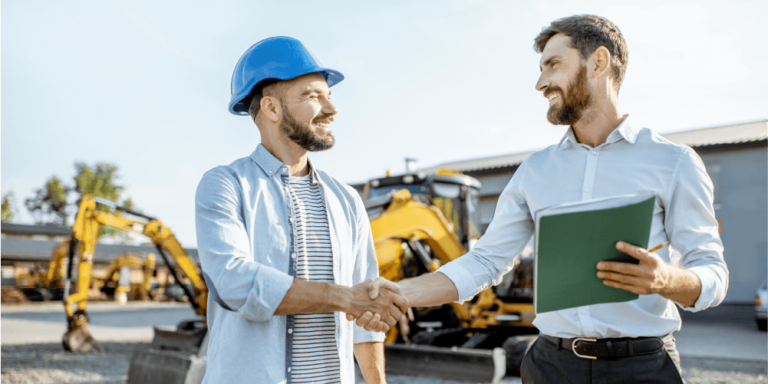 Contractor shaking other contractor's hand on a jobsite