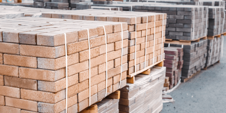 Photo of pallets of bricks at a construction site