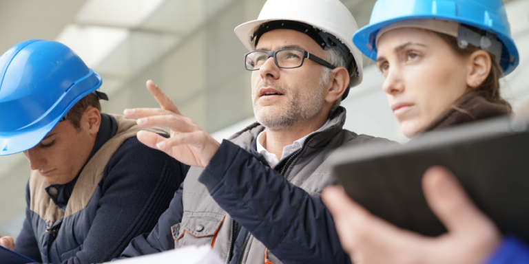 Construction contractors discuss terms of different project delivery types .