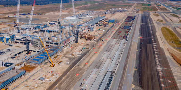 Photo of the outside of an airport under construction