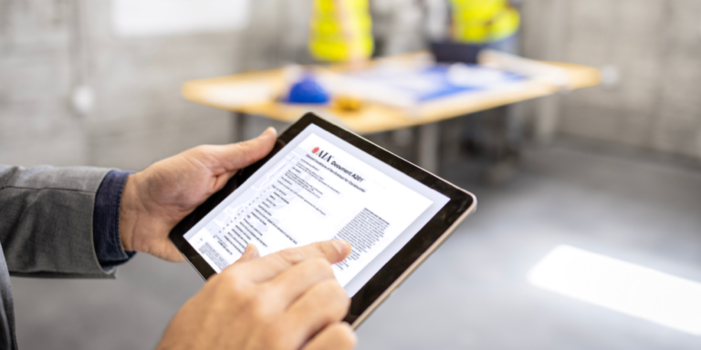 Photo of a tablet displaying the AIA 201 document preview on the screen