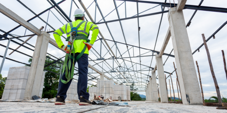 Photo of worker on a commercial construction space