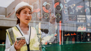 Construction worker with AI data graphs superimposed
