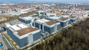 Data centers with visible city infrastructure around them