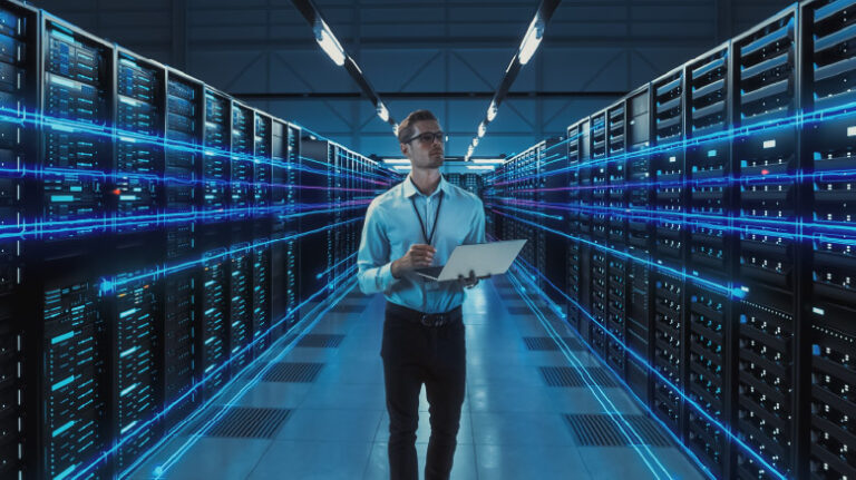 Construction professional inspecting data center server room