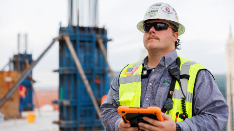 Construction Manager with a tablet on a jobsite