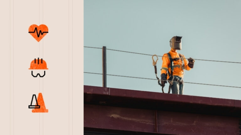 Worker on a jobsite wearing PPE and a harness with 3 safety icons on the left side (worker health, PPE, and safety cones)