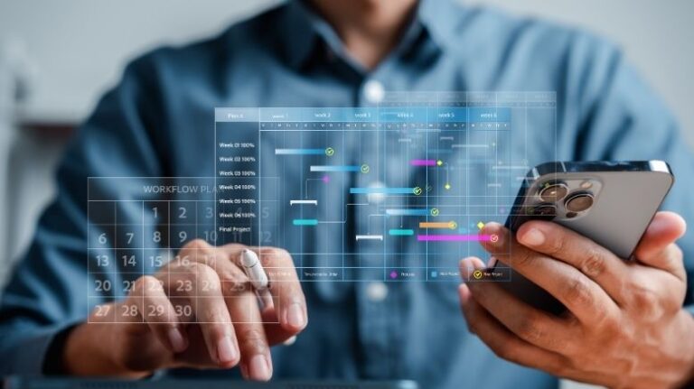 Construction financial software illustrated by showing a construction pro on their phone with what's happening on screen superimposed over the photo
