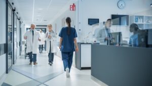 Photo of a hospital hallway and nurses' station