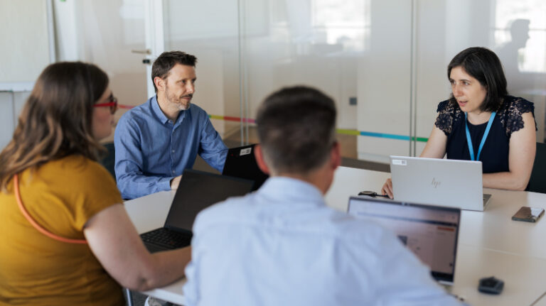 Financial discussion at an office table